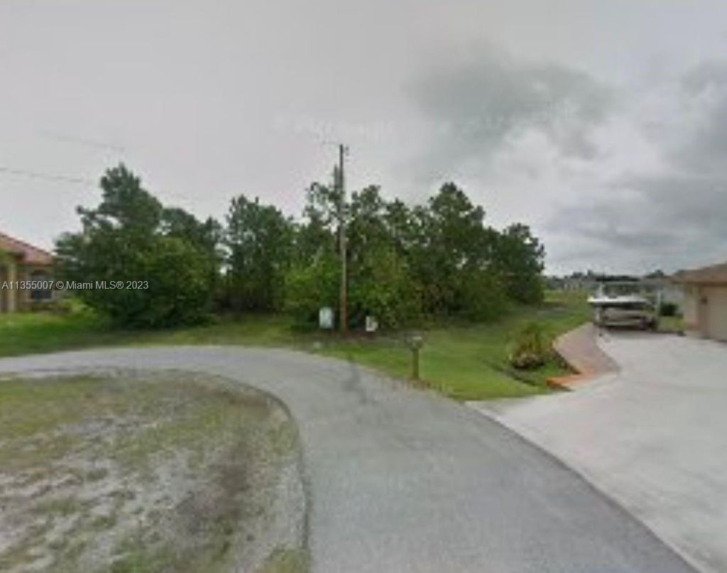 Photo of 5567 Wesley Ct, Port Saint Lucie, FL 34986 (MLS # A11355007)