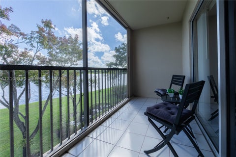 Photo of 1351 SW 141st Ave #309G, Pembroke Pines, FL 33027 (MLS # A12108330)