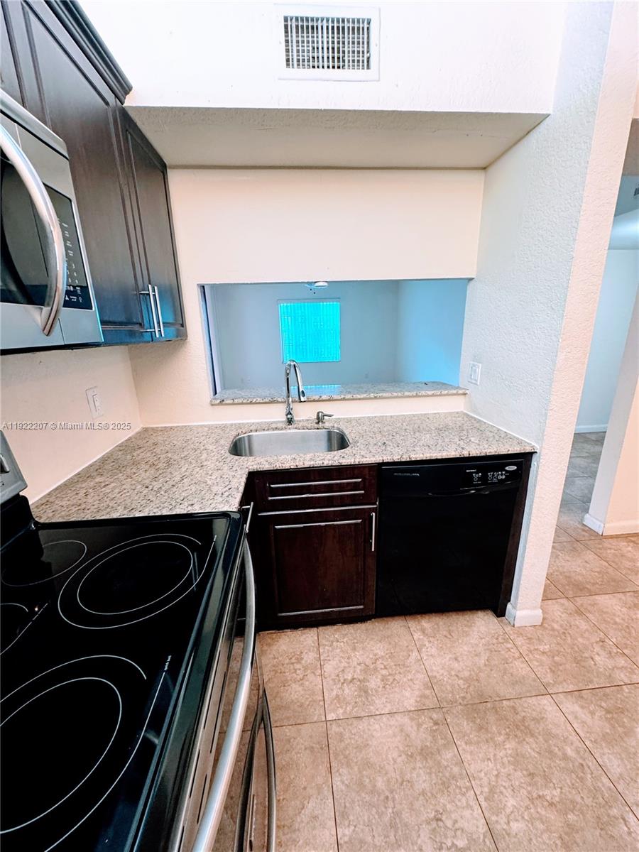 OPTIMA VILLAGE I-E CONDO - Residential Lease