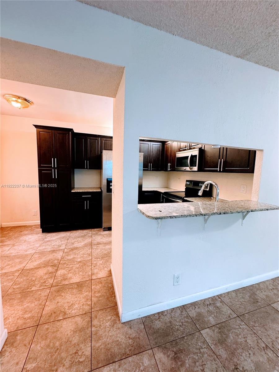 OPTIMA VILLAGE I-E CONDO - Residential Lease