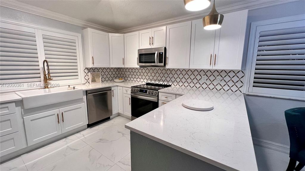 Photo of 6762 Via Regina, Boca Raton, FL 33433 (MLS # A12000361)