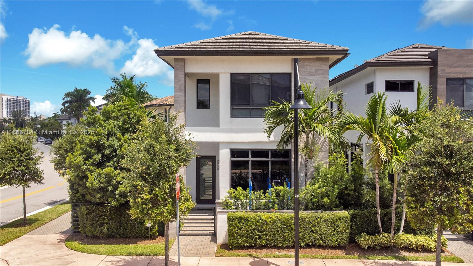 Welcome to this stunning modern corner Cadiz model offering upscale living in the heart of Downtown Doral. This 3-B, 3.5-B, 2 car garage w/side patio spans 2,664 SF total area & blends sophisticated design & comfort. Step inside & discover soaring ceilings, expansive windows w/full impact glass & smart home features that elevate daily living. The chef’s kitchen is a masterpiece w/sleek European-style cabinetry, incl. a quartz waterfall island w/bar seating, built-in luxury SS appliances & pendant lighting for just the right touch of style. Enjoy resort-style amenities: Pool, gym, basketball, indoor running, splash park, party room, game rooms +more. Walking distance to lots of dinning/entertainment options, as well as Publix & Downtown Doral Charter Elementary School. Not on a flood zone!