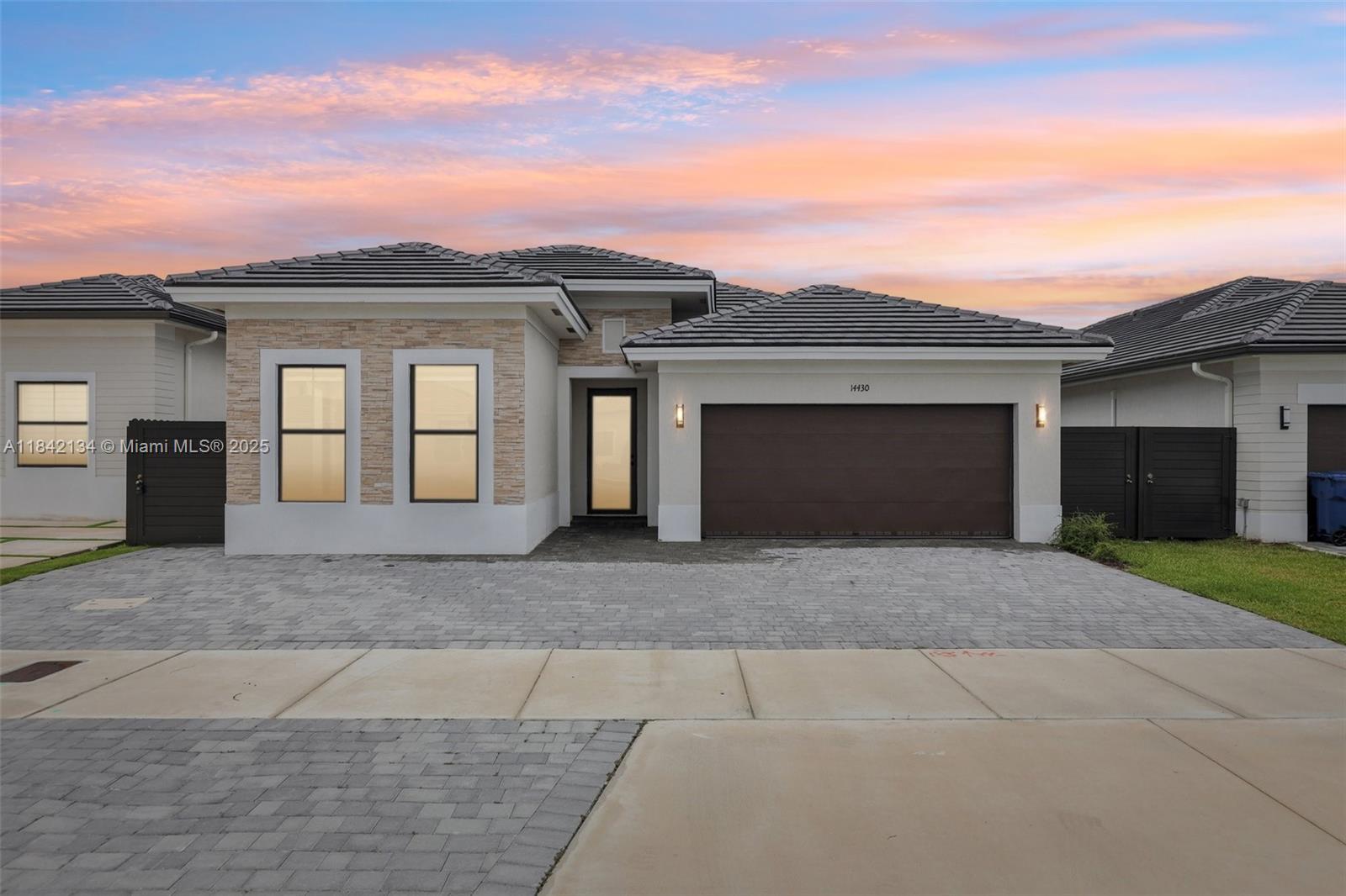 Luxury 2024-built home in prime West Miami! This 4-bed, 3-bath residence features high ceilings, sleek tile floors, and a chef’s kitchen with quartz counters, stainless steel appliances, and a large island. The spacious primary suite offers a walk-in closet and spa-like bath with dual sinks and glass shower. Enjoy a large private backyard, impact windows and doors, and a 2-car garage. Located near top-rated schools, dining, and shopping. Turn-key and move-in ready!