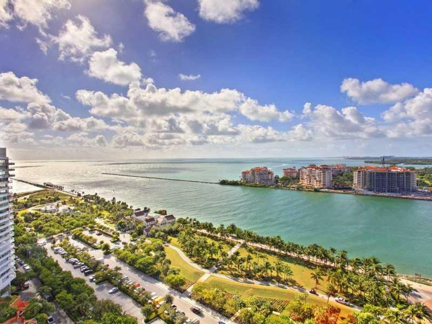 Amazing views welcome you the minute you walk into this beautiful contemporary residence in prestigious Portofino Towers. The "03" Line provides an open expansive living & dining room area w/floor to ceiling windows that accentuate the dazzling views of t he Atlantic Ocean, Biscayne Bay, Fisher Island & Downtown Miami. Portofino is a luxurious condominium located in the highly coveted South of Fifth neighborhood. It offers unparalleled amenities all just steps away from the beach, shopping & restaurants.