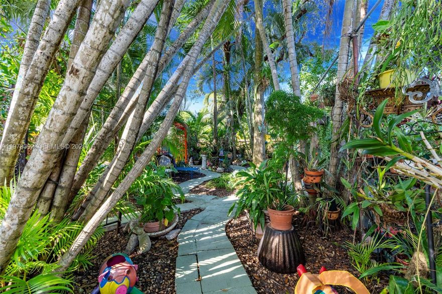 East Coast meets West Coast style with vibrant, retro flair and lush, natural landscaping with exotic fruit trees ***including banana, ice cream mango, loquat and chocolate pudding trees***. Unmatched Security & Investment in Prime Fort Lauderdale. This one-of-a-kind, concrete-stronghold home is 100% Hurricane-Impact and custom-built. The Key Features: Concrete walls, roof, and floors with commercial steel reinforcement. Includes a fully enclosed Bunker-Style Safe Room with a shower, toilet & Sink along w/ a separate entrance. Dramatic Design: 14' ceilings, custom 10' entry door, open-plan loft bedroom, and 24' high ceiling in the living area. Outdoor Living: Multiple terraces/patios, including a tranquil Primary Suite sun deck, a fireplace-view patio, and a zen walkway leading to an outdoor fire pit. Fully-engineered ADU PAD (Accessory Dwelling Unit) is already poured with a separate electric panel—ready for immediate build-out (rental unit/in-law suite. Future Plans Available: Architectural plans exist for a 3rd floor, elevator addition, and downstairs bathroom. Prime Location: Smack in the perfect part of Ft. Lauderdale—all major points (Marina Mile, I-95, FLL Airport, Las Olas, Beach, Fishing) are just 15 minutes away. Invest in a legacy of Security, Quality. NOT a cookie-cutter. High elevation @ 2361 SW 18th Ave, Ft Lauderdale, FL LOW Electric Bills!