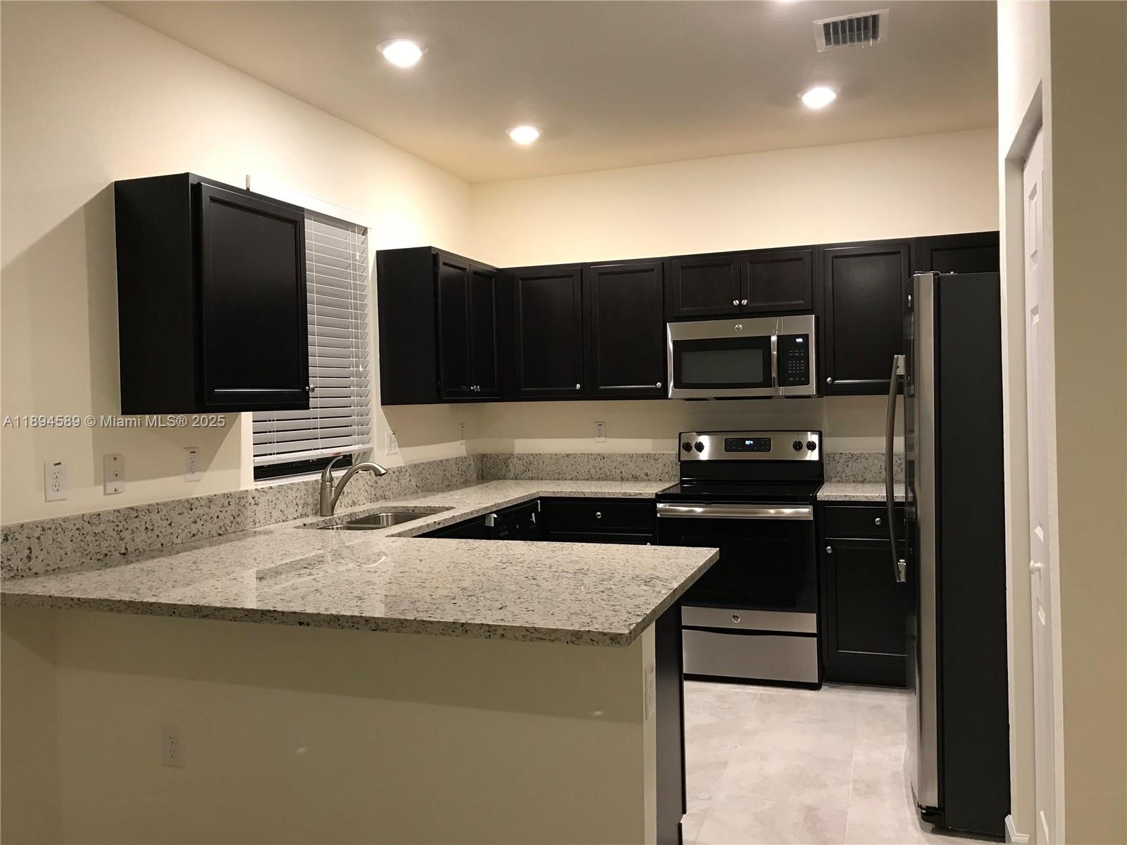 AQUABELLA SECTION ONE - Residential Lease