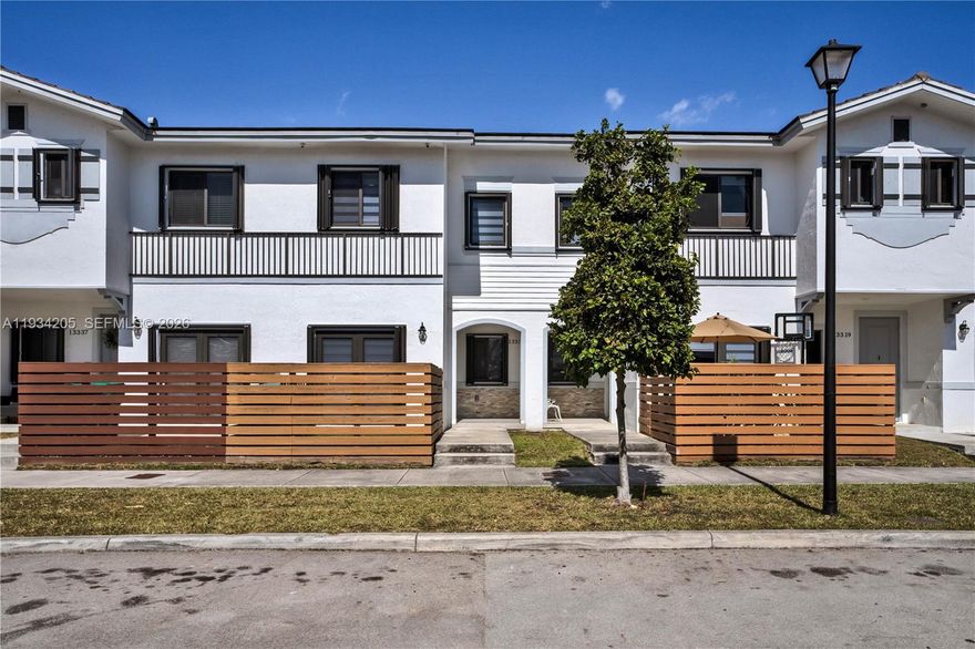 Beautiful two-story townhome built in 2020, offering a modern design and immaculate condition. Features granite countertops, wood cabinets, tile flooring on the first floor and laminate flooring on the second floor. Washer and dryer inside the unit and modern window treatments throughout.
Functional layout includes living room, dining area, and family room. Enjoy a small front patio and a fully fenced backyard ideal for family gatherings and BBQs. Located in a desirable neighborhood with excellent schools, just steps from US-1 and with access to the Turnpike. Two private parking spaces located behind the property.