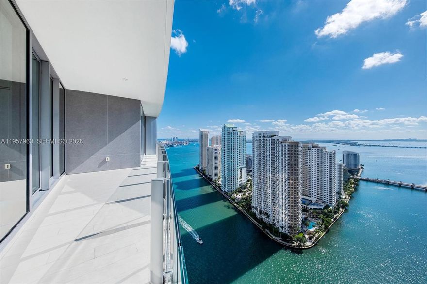Live the ultimate Miami lifestyle where architecture, luxury, and waterfront magic collide. This remarkable 2 bedroom /2.5 bath at the iconic Aston Martin Residences offers panoramic bay, river, ocean and Miami skyline views through floor-to-ceiling glass.  Enjoy an effortlessly elegant open split floor plan w/natural light throughout, chef-caliber kitchen with premium finishes, marble floors, high ceilings, spa-inspired baths with freestanding tub and rain shower in master, spacious closets, and a private balcony floating above the water. Residents indulge in a full service building with four levels of unmatched amenities - sky pool, wellness spa, two-level fitness center, lounges, virtual golf, art gallery, elite consierge and marina. Located at the edge of Downtown Miami and Brickell.