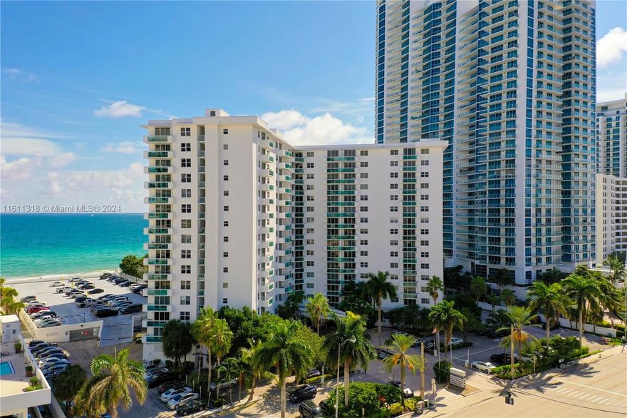 One-of-a-kind luxury beachfront loft/studio, fully renovated by owner/architect. Features 1.5 bathrooms. Italian tile floors (24x48), new ceilings, walls, GE electrical panel and wiring, LED dimmable lighting, new A/C ducts with linear vents, Nest thermostat, new plumbing, automated electric curtains, and blackout shades. Custom-made closets with 17 storage spaces. Open kitchen concept with large peninsula, high-end cabinets, new Samsung stainless steel appliances. Designed office with high-end cabinetry, desk, lighting, and pocket door for privacy. Open bedroom with full bathroom including his and hers, standup shower, mirrors, lighting, and outdoor storage unit. Guest bathroom fully custom-built. Assoc. includes water, internet, cable, WiFi, up to 2 parking spaces, and valet parking.