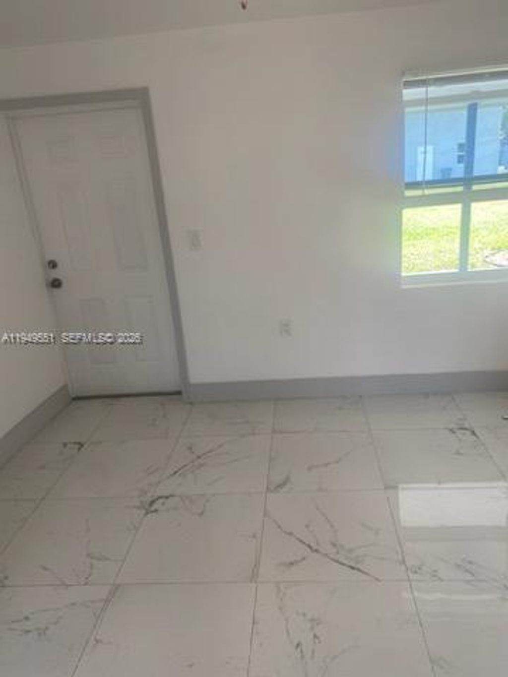Photo of 6045 Buchanan St #1, Hollywood, FL 33024 (MLS # A11949551)