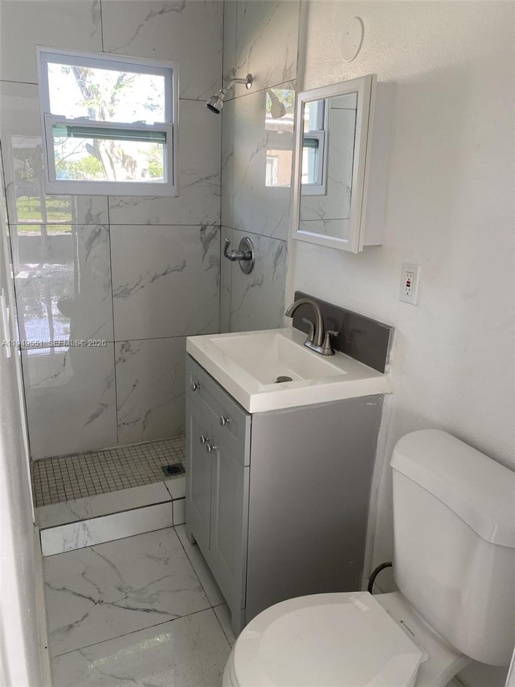Photo of 6045 Buchanan St #1, Hollywood, FL 33024 (MLS # A11949551)