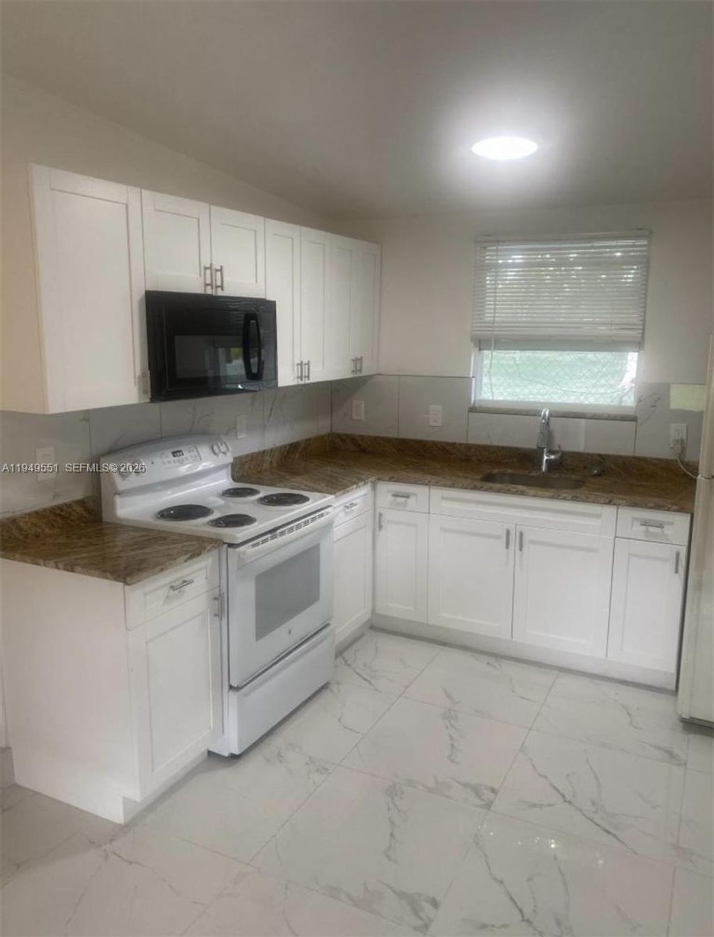 Photo of 6045 Buchanan St #1, Hollywood, FL 33024 (MLS # A11949551)