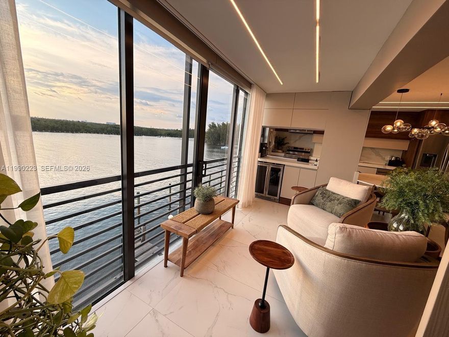 Stunning fully renovated waterfront residence in an exclusive boutique Intracoastal building.  This 1,060 SF unit offers 2 full suites and a thoughtfully designed open-concept layout filled with natural light. High-end finishes include large-format porcelain flooring, a sleek modern kitchen with quartz countertops, stainless steel appliances, and custom cabinetry throughout.
The residence is enhanced by a dedicated office space and refined design elements, creating a sophisticated yet comfortable living environment. Both suites provide privacy and elegance, featuring beautifully updated en-suite bathrooms with contemporary finishes and glass-enclosed showers.
Step onto your private balcony and enjoy serene Intracoastal views with breathtaking sunsets and passing boats — a true waterfront lifestyle experience.
This boutique building features only 30 residences, offering exclusivity and tranquility. Ideally located just one block from Hollywood Beach and the iconic Broadwalk, with easy access to dining, cafés, and coastal entertainment.