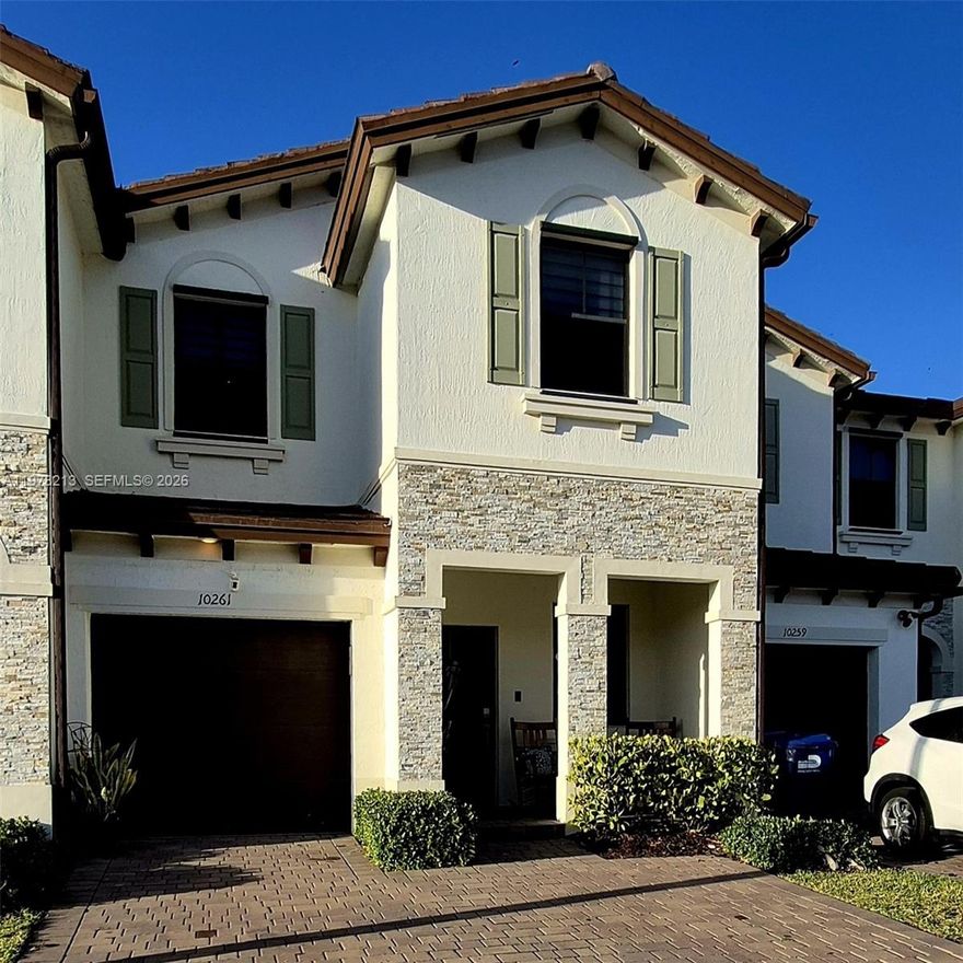 Beautiful and spacious 4-bedroom, 2.5-bath townhouse built in 2021, offering 1,966 sq. ft. of modern living space in the desirable Crystal Cay community. This well-maintained home features a brick paver driveway, one-car garage, and a private backyard with brick pavers and a 6-ft wood fence—perfect for relaxing or entertaining. The open-concept layout includes a stylish kitchen with chocolate brown cabinets, stainless steel appliances, and plenty of storage. Tiled flooring on the main level and carpet upstairs provide comfort and style throughout.

The spacious primary suite features a vaulted ceiling, his-and-her closets, and a large bathroom with double sinks. Additional highlights include zebra-style blinds, a dedicated laundry room with washer and dryer, smart home readiness, and an energy-efficient tankless water heater.

Residents enjoy access to a community pool and clubhouse with a low HOA. Ideally located near Cutler Bay City Center, shopping, dining, and entertainment, with quick access to US-1 and the Florida Turnpike. Situated in an area with great schools. A perfect blend of comfort, convenience, and modern living—move-in ready!