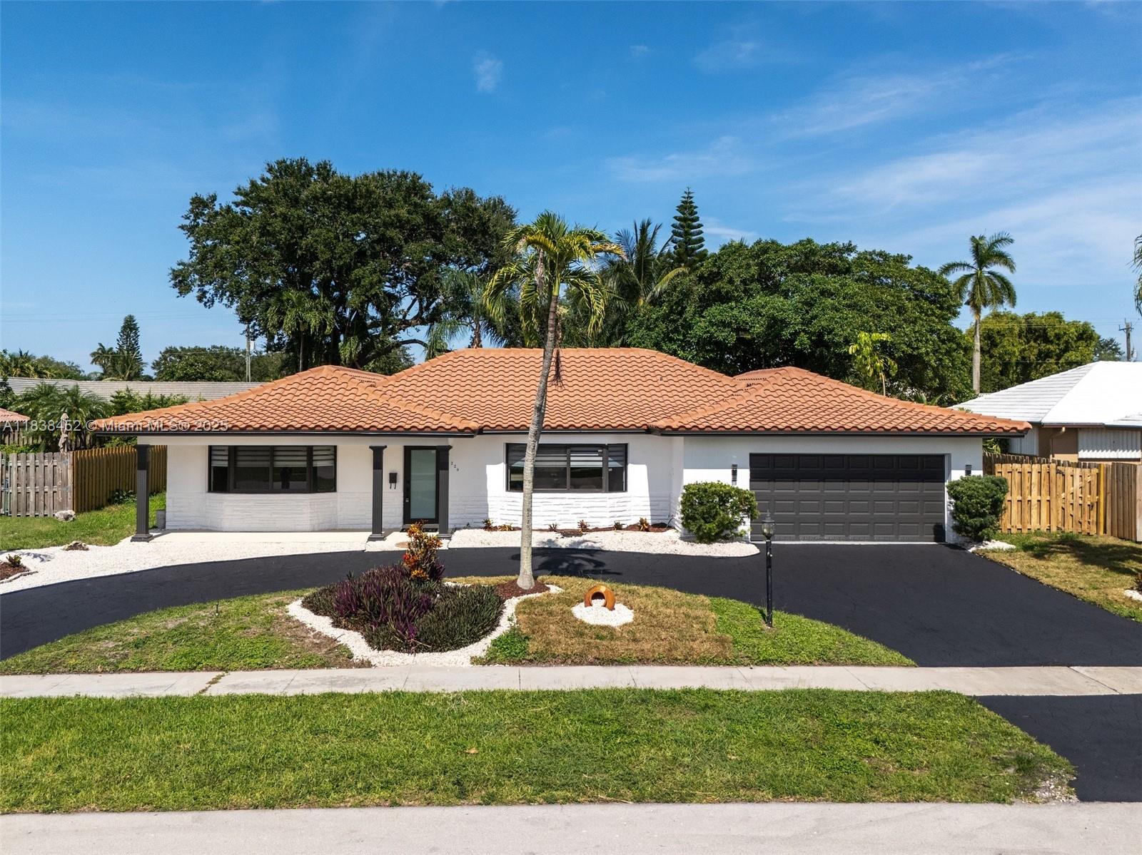 Beautifully updated 4-bed, 3-bath pool home, With a newer tile roof, impact windows and doors, and a other upgrades, this home offers peace of mind, comfort, and style all in one. Step inside to discover an open and airy layout featuring upgraded bathrooms and a fully renovated kitchen with white shaker wood cabinetry, light-colored granite countertops, and SS appliances. Enjoy easy indoor-outdoor flow to your private backyard oasis, complete with a sparkling pool, spacious patio, and plenty of room to relax or host gatherings. Modern tile flooring throughout, Spacious bedrooms and updated bathrooms with quality finishes, Fresh paint and well-maintained landscaping. Close to I-95, 595, the Turnpike, FTL-Hollywood International Airport, and major shopping centers, restaurants, and schools.