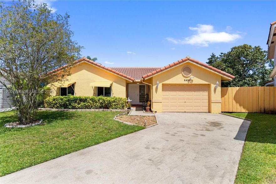 Stunning waterfront home in Plantation, located in the highly sought after Beaumont Estate- a family friendly community with just 29 homes.
Experience the perfect blend of elegance and comfort. This home features a spacious living room perfect for relaxing or entertaining. 
Enjoy breathtaking views of tropical fruit trees in the oversized backyard from the comfort of the large Florida room, perfect for enjoying south Florida weather. LOW HOA fee. This perfect retreat is just minutes from shopping, dining, and schools. Leasing is permitted, adding flexibility, whether full-time or seasonal.
A true must see!