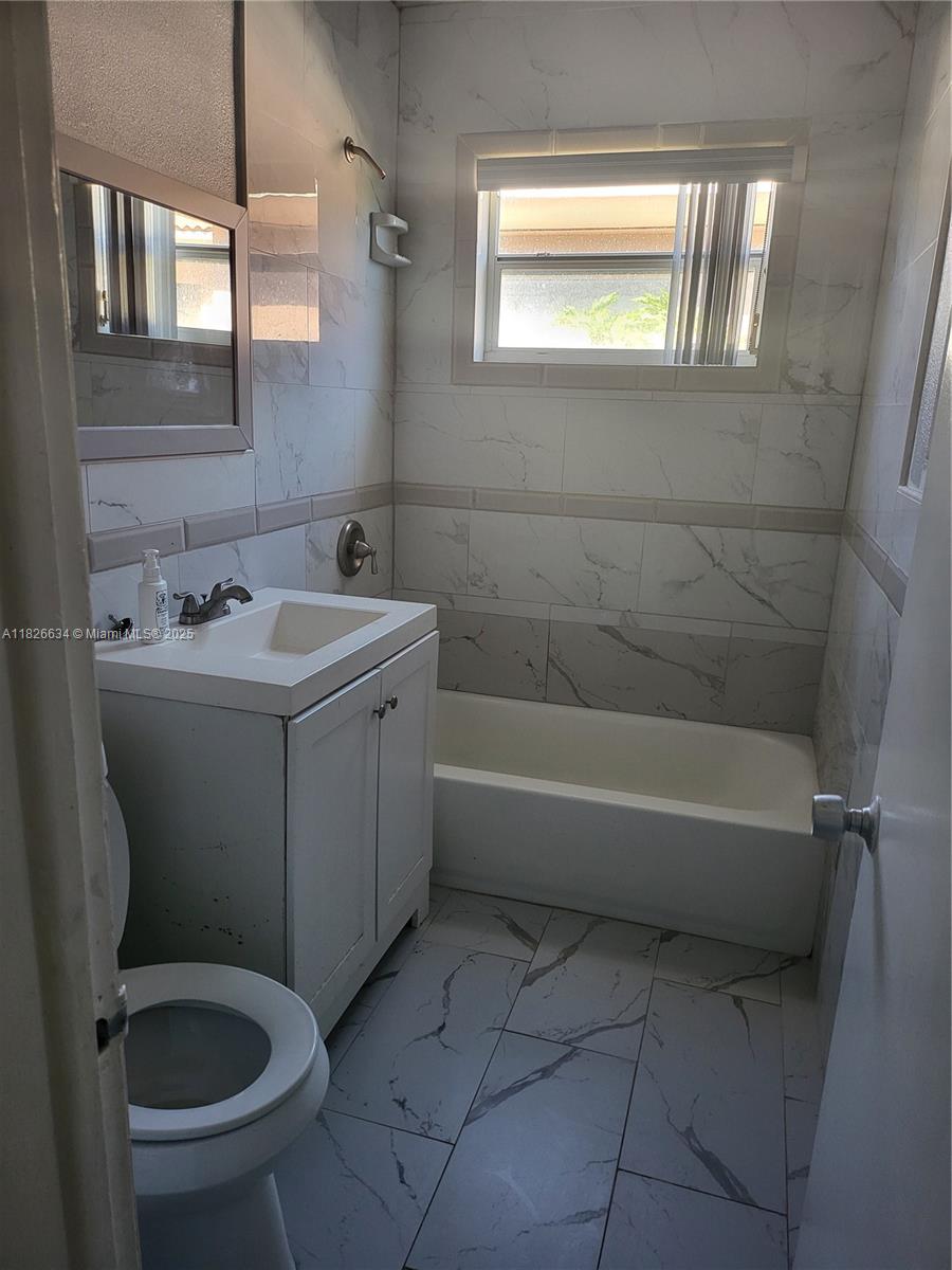 Live comfortably in this spacious 2-bedroom, 2-bath home featuring a versatile room in the rear — perfect for an office, guest room, or extra living space. Located in a quiet, well-kept neighborhood. You’ll enjoy the close proximity to shopping, dining, and just minutes from the beach. Water is included in the rent, courtesy of the landlord. Don’t miss out on this well-located and affordable gem!