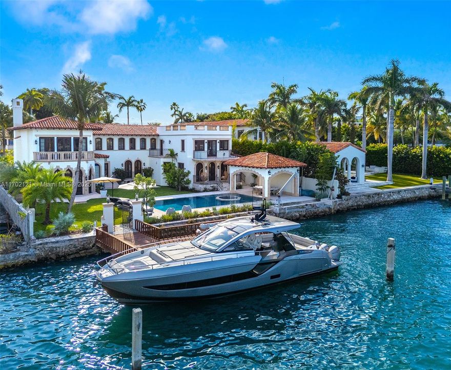 Perfectly nestled in the estates of Palm Island, a Mediterranean marvel with over 15K total SF of living space has been masterfully restored. Maintaining original architectural features, the estate boasts modern, state-of-the-art amenities + technology. Sprawling over 30K SF of lush grounds with exotic trees, fountains and 100’ unobstructed waterfront, multiple scenic outdoor lounging+entertaining areas abound,including a rooftop and private deck over the water. The mansion offers 6beds 7/2bths, office, insolated movie theater, grand saloon, formal dining, cognac rm & art gallery. Chef's kitchen features 3 Wolf gas ranges+Subzero appl, enormous island, family room and 2nd dining. The guest villa has a Turkish hammam/sauna, jacuzzi,massage+gym. 2nd fl 3/2.5 living/dining/kitchen 2 elevators
