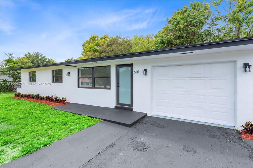 Discover this stunning 3-bedroom, 2-bathroom home in the heart of Fort Lauderdale! With 1,102 sq ft under air (1,274 sq ft total), an oversized 8,993 sq ft lot, and an attached garage, this property is perfect for entertaining. Features include impact windows and doors, fresh interior and exterior paint, an updated roof, a modern kitchen with quartz countertops and new stainless steel appliances, stylish bathrooms, laminate wood flooring, and a new central A/C. Conveniently located near I-95, Las Olas, and downtown Ft. Lauderdale and the beaches, this home combines beauty, functionality, and prime access to South Florida's best. A must-see!