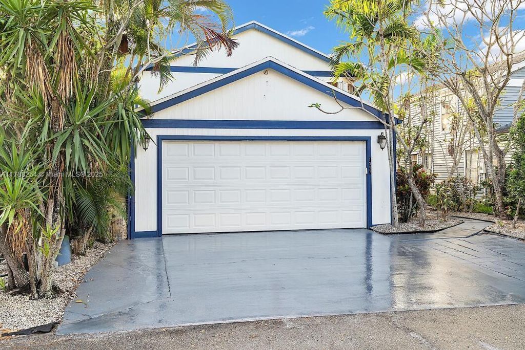 Photo of 1397 Apple Blossom Ln, West Palm Beach, FL 33415 (MLS # A11788254)