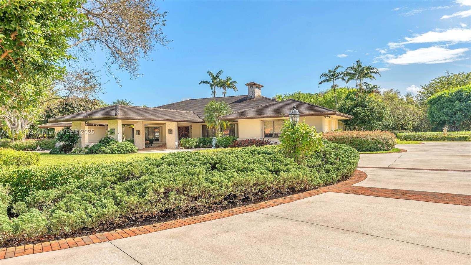 Situated on 4.74 acres in Redlands' "Millionaires Row," this luxurious estate stands out with over 7,400 sq ft of refined living space. The elegantly landscaped grounds invite with flowering trees, walking paths, and serene sitting areas. Enjoy the convenience of a gated entry, circular driveway, porte-cochère, and a 2+ car garage for ample parking. Inside, find meticulously crafted interiors w/ plastered ceilings, crown moldings, and exquisite chandeliers enhancing the foyer, dining, living rooms and family room, including surround sound & a historic Italian mantel. A gourmet's dream kitchen awaits w/high-end appliances & expansive counters. Complete w/ a 60kW generator, this impeccably maintained home is the epitome of luxury living, designed for those who seek exclusivity and comfort.