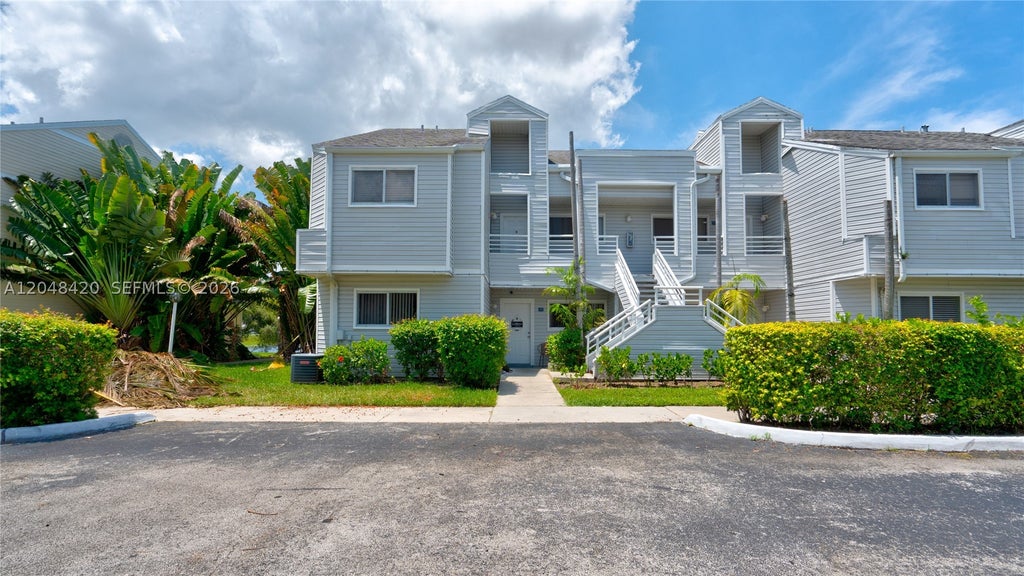 Photo of 3409 NW 44th St #101, Oakland Park, FL 33309 (MLS # A12048420)