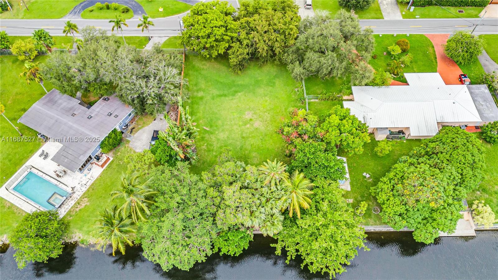 Incredible Value for 15,000+ SQFT of Prime Waterfront Land! Nestled between Biscayne Park and Miami Shores, and located minutes from Miami Country Day School, this property offers the perfect opportunity to build your dream home on a spacious 15,200 SQFT lot. The seawall is in excellent condition, the property is already elevated, and is complete with beautiful, mature trees on-site. Due to its location in Unincorporated Miami-Dade Country, the land offers a range of possibilities and flexibility for development, including the potential to be used as a short-term rental property. Inquire for more details!