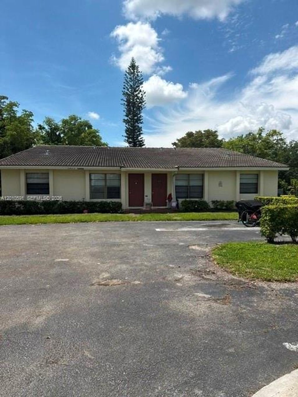 Photo of 10406 NW 36th St #10406, Coral Springs, FL 33065 (MLS # A12010591)