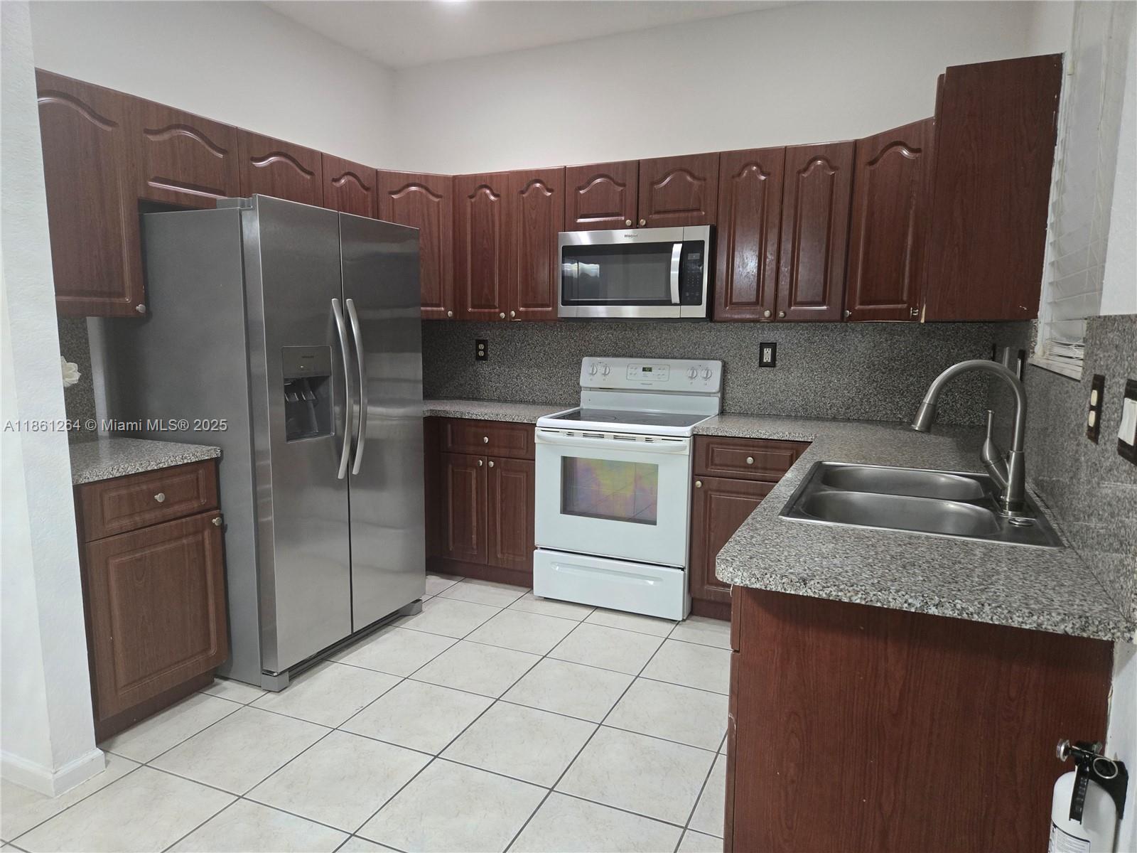 21205 NW 14 PL 819