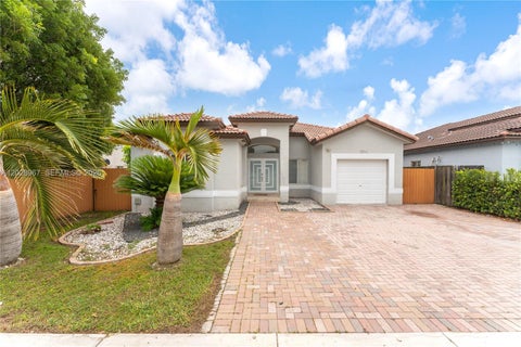 Photo of 28021 SW 133rd Pl, Homestead, FL 33033 (MLS # A12028967)