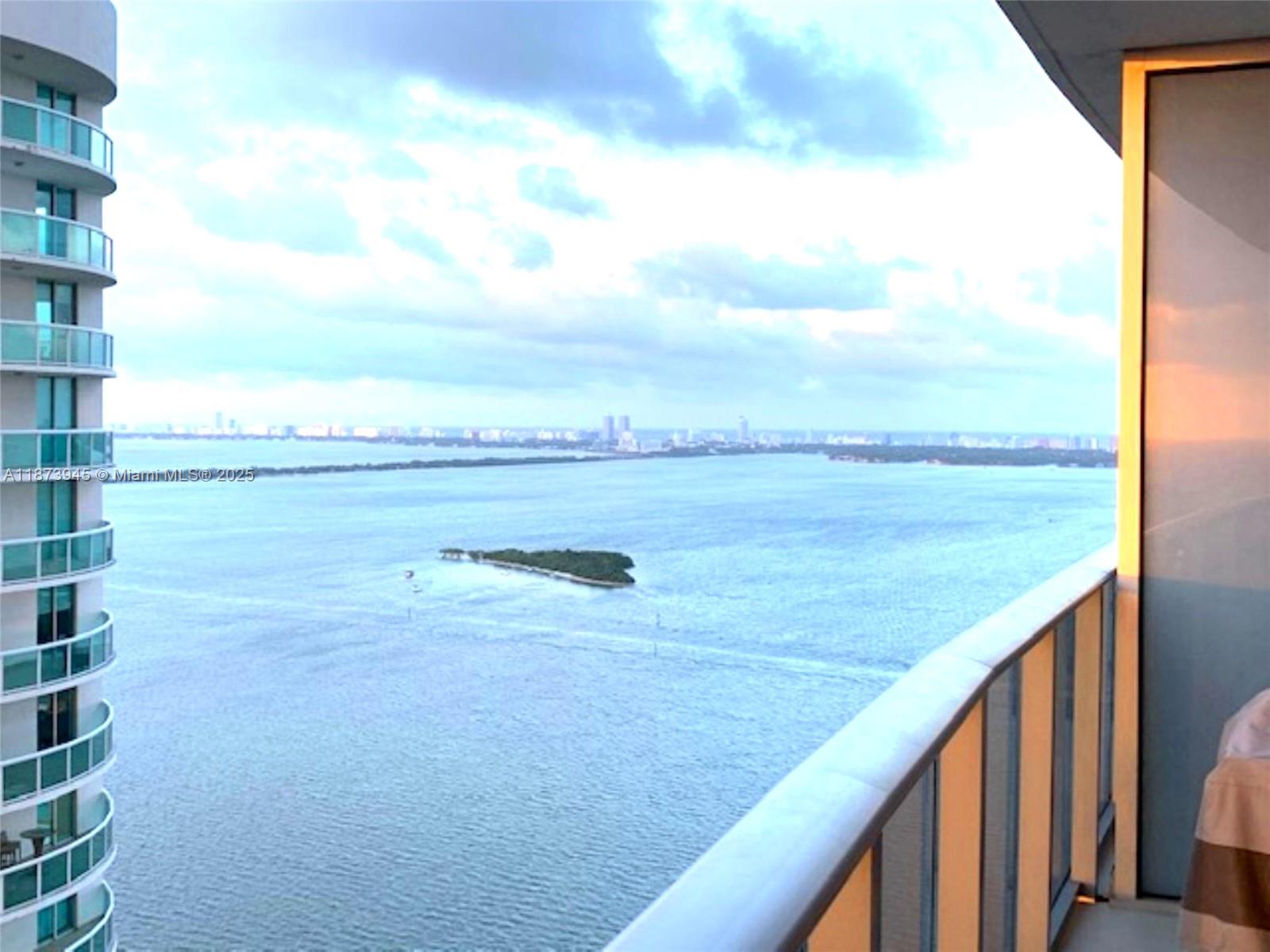 Luxurious Residence Beautiful finishes in these 2 bedroom +dens ,3 bathroom at Aria on the Bay, directly across the street from Biscayne Bay in the Arts and Entertainment District. Featuring Private Elevator Entrance to your Foyer, Bosch stainless steel appliances, Italian wood cabinets by Italkraft, quartz countertops, Brizo Faucets .White porcelain floors throughout the unit, floor to ceiling windows. Master Bath & Second Bath w/ dual sinks. Large balcony. Full-service Building with 2 curved sunrise/sunset pools, Hot Tub, Indoor/Outdoor Social Room, State of the Art gym and yoga room, BBQ area with summer kitchen, Theater, Kids Playroom, Business Center. Valet Parking. Minutes from Wynwood, Midtown, Design District, South Beach and Downtown.