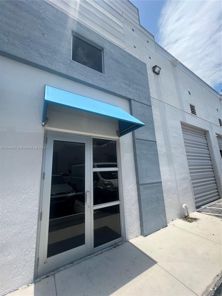 West Airport Palms is an Industrial Park near Miami International Airport's cargo terminals. Ideal location, south of NW 25th St & 70th Ave, only blocks from the SR826 - Palmetto Expressway. A total of 1,681 SF, including: 300 SF of office space, a 300 SF mezzanine for additional storage, and 1,081 SF of warehouse storage space. 20 ft. high ceilings. One street level overhead door, 2 assigned parking spaces and visitor parking. The lease price of $3,500 per month includes water & sewer, fees & taxes.
