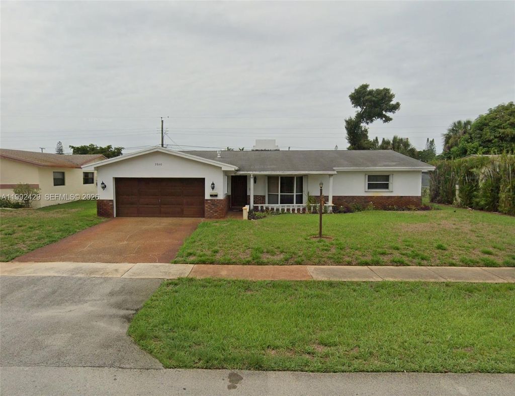 Photo of 3860 NW 5th Ct, Lauderhill, FL 33311 (MLS # A11992429)