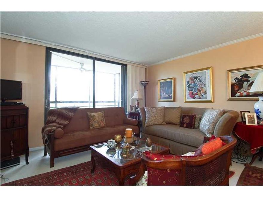 PRISTINE CONDITION ...LARGE 1 BED&1.5 BATH  IN BEAUTIFUL AND DESIRABLE THREE ISLANDS AREA.KITCHEN UPGRADED FAIRLY NEW APPLIANCES, LOTS OF CLOSET SPACE. TILE AND CARPET THROUGHOUT.CROWN MOLDING IN LIV/ DIN AREAS.SHOWS WELLS!!  BUILDING OFFERS LOTS OF AMENT IES. CLOSE TO BEACH AND SHOPPING.SOLD AS IS! NEAT AND CLEAN. . GREAT OPPORTUNITY. SHOW AND SELL TODAY!! CAN BE RENTED RIGHT AWAY FOR A MINIMUM OF 6 MONTHS ONLY 1 RENTAL PER YEAR. EASY TO SHOW SEE VIRTUAL TOUR