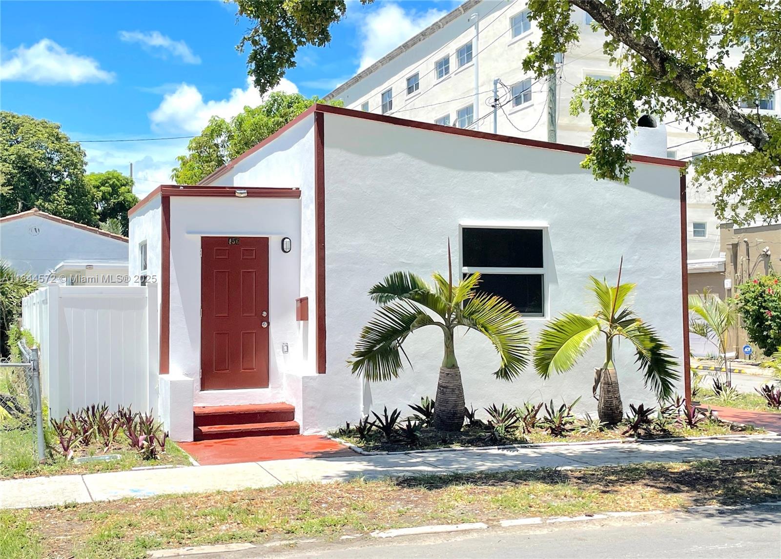 Spotless and recently updated 2-bedroom 1-bathroom single family home walking distance to downtown Hollywood circle. Home features include fenced in backyard, open and eat in kitchen, tile throughout, washer and dryer in unit, covered parking, and air conditioned multi-purpose room. Home is conveniently located downtown Hollywood, near great restaurants and bars, and 1 mile to the beach. Application and screening required. Lawn maintenance included with rent. Pet okay with additional fee. First month's rent, last month's rent, and security deposit due upon move in.