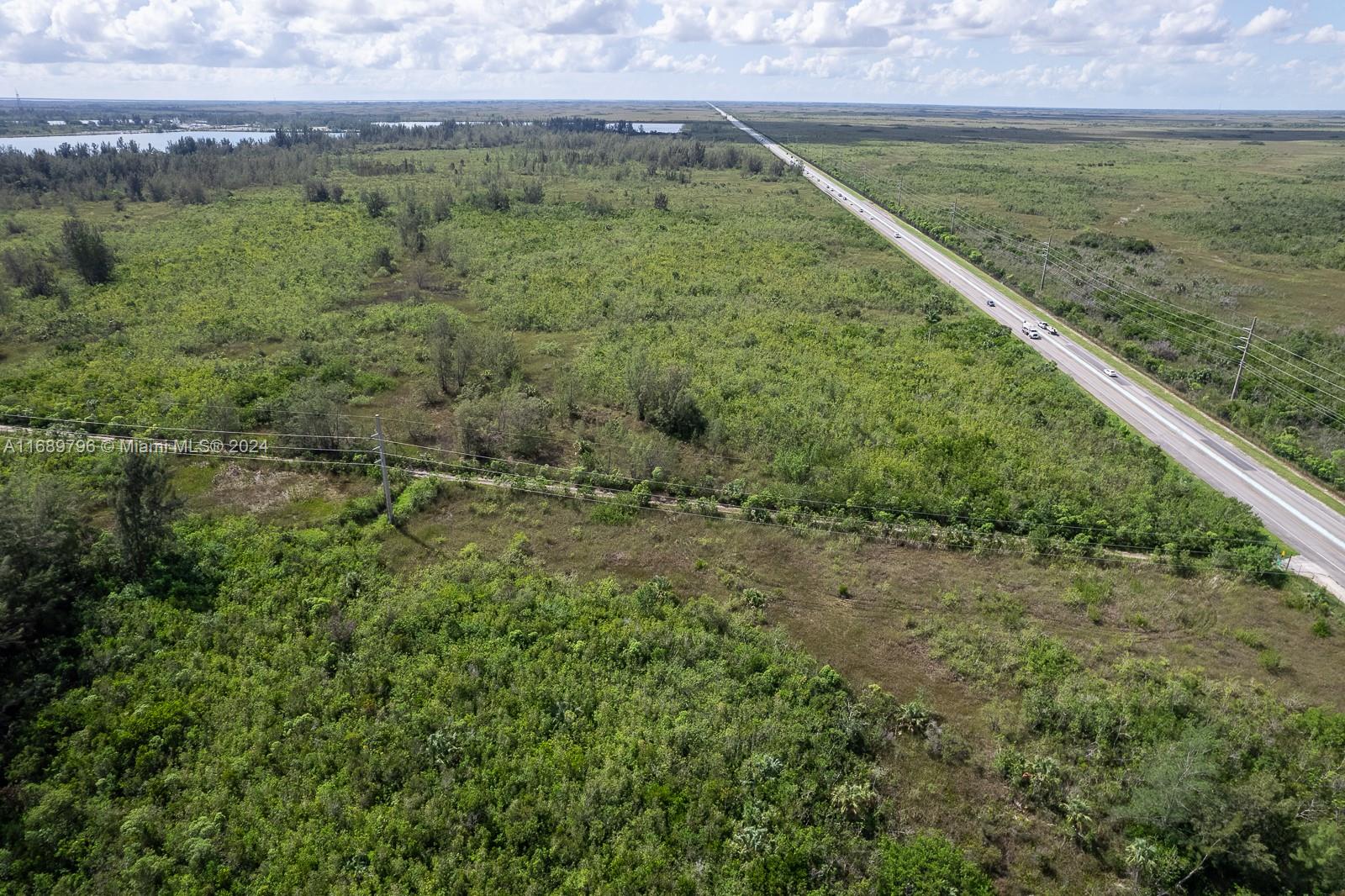 6.5 acres lot directly on US1 and SW 392 street in Miami Dade County. This corner lot is the road that connect US1 to Old Card Sound Road. The lot is on the east side of the Highway on the way to the Florida Keys from Miami.
Currently it has no zoning, Environmentally sensitive, but just has great potential to rezone to road sign or marshalling yard for future road expansion.
Heavy power is located on the SW 392 street, and the water main runs with US1.
