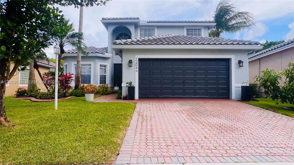 Photo of 12046 NW 47th ST #12046, Coral Springs, FL 33076 (MLS # A12023594)