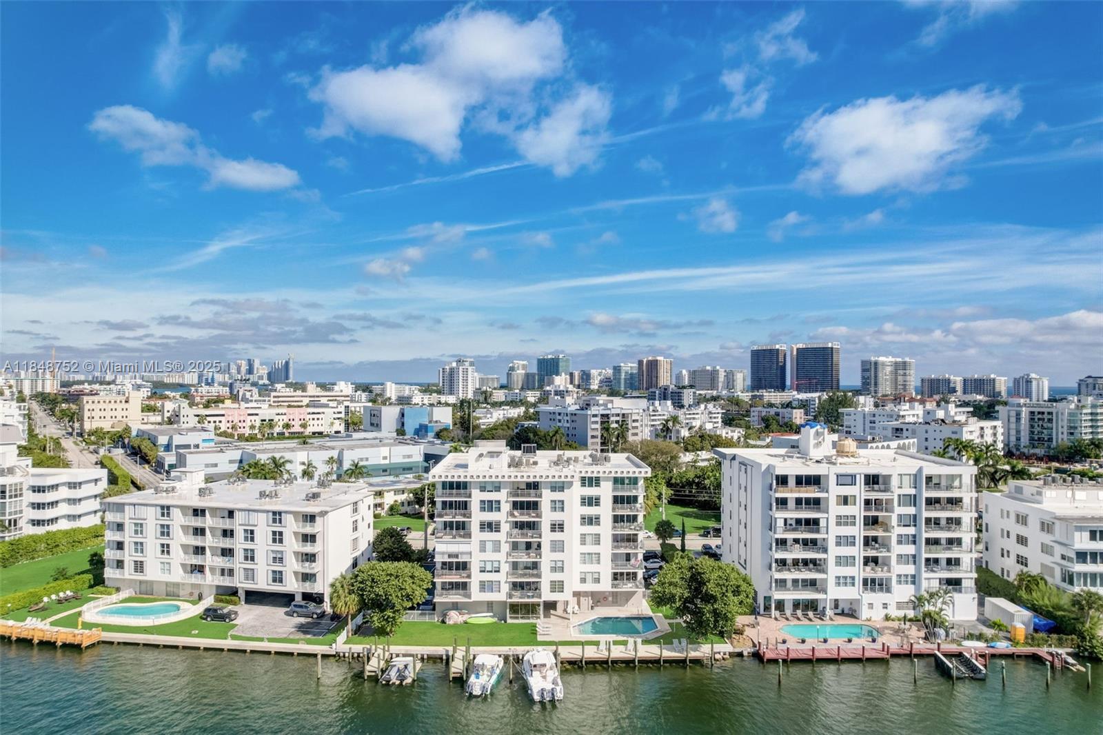 Waterfront Living at Its Finest in Bay Harbor Islands
Beautifully renovated 2-bedroom, 2-bathroom in a boutique waterfront building with only a few units in the heart of exclusive Bay Harbor Islands. All impact windows, generous storage, and modern finishes throughout.
Sweeping views of Indian Creek Lake and Island from the heated waterfront pool, available boat slips. The building has already passed its 50-year recertification, major upgrades, including a new seawall, new balconies, and full concrete restoration.
Bay Harbor Islands is a serene, walkable neighborhood just steps from coffee shops, local dining, the beach, and top-rated Public K–8 school.
Motivated seller – bring your offers and make this waterfront retreat yours today!