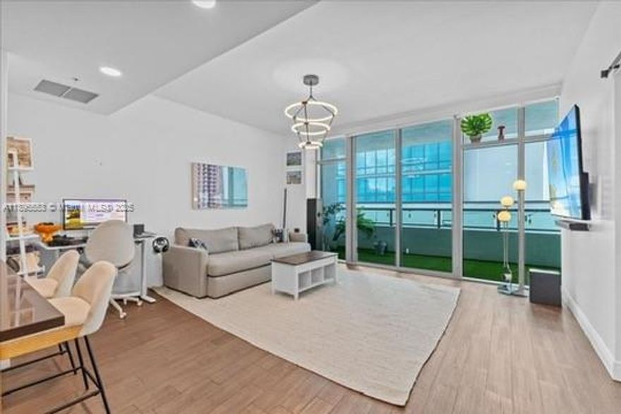 Welcome to Unit L202 at Midtown 4 — a sophisticated 1-bed + 2-bath condo spanning 711 sq ft, built in 2008. Sunlit interiors feature floor-to-ceiling windows, tile floors, and impact-resistant doors. You’ll enjoy modern appliances, in-unit laundry, and your own covered parking. The community offers resort-style amenities including a pool, fitness center, sauna, BBQ area, and 24/7 security. Steps from The Shops at Midtown, Design District, Wynwood, and with easy access to Brickell and downtown. Embrace Miami living at its best!
