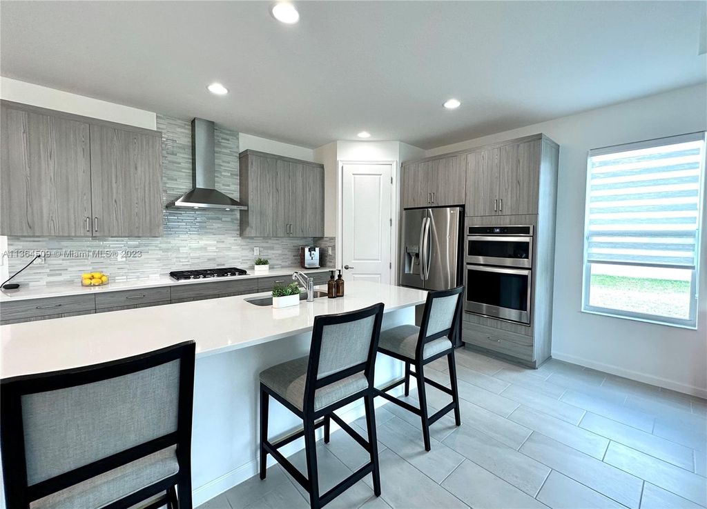 Photo of 11805 SW Lyra Dr, Port Saint Lucie, FL 34987 (MLS # A11364509)