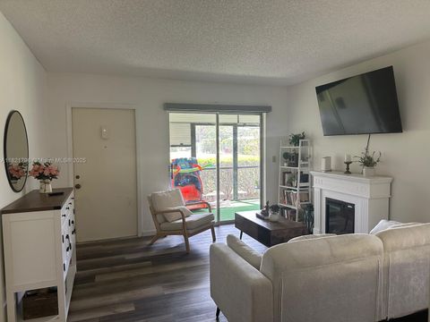 Photo of 6447 Chasewood Dr #C, Jupiter, FL 33458 (MLS # A11821796)