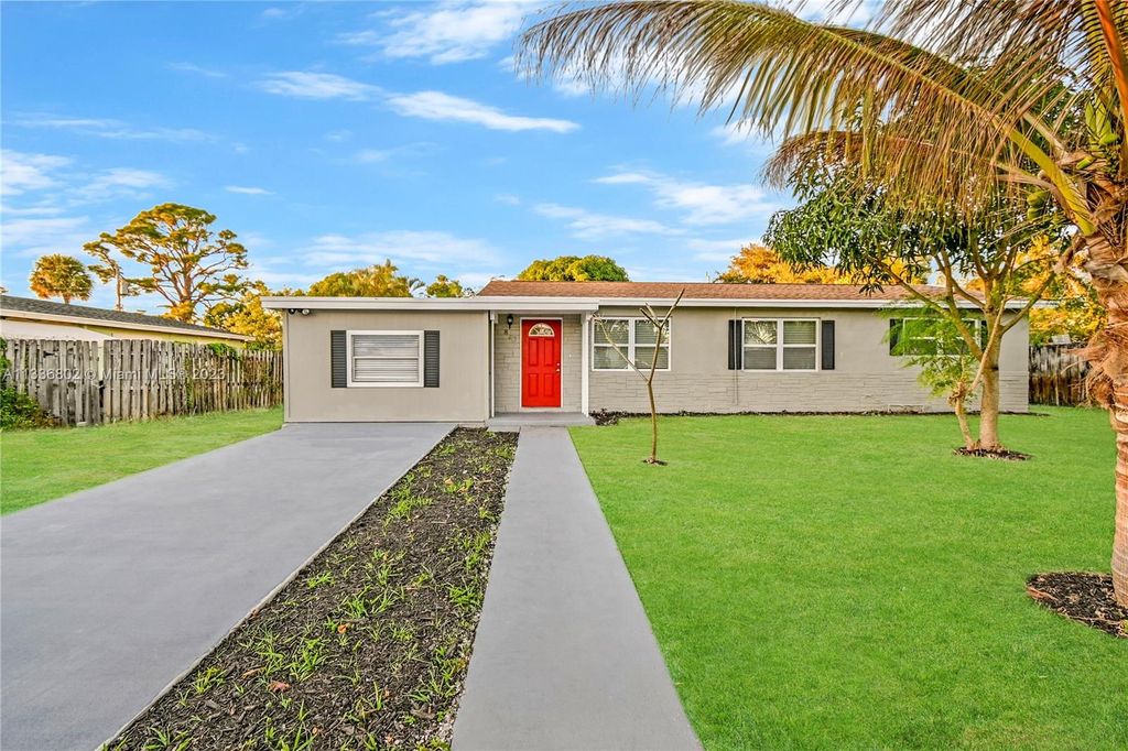 Photo of 823 Magnolia Dr, Lake Park, FL 33403 (MLS # A11336802)