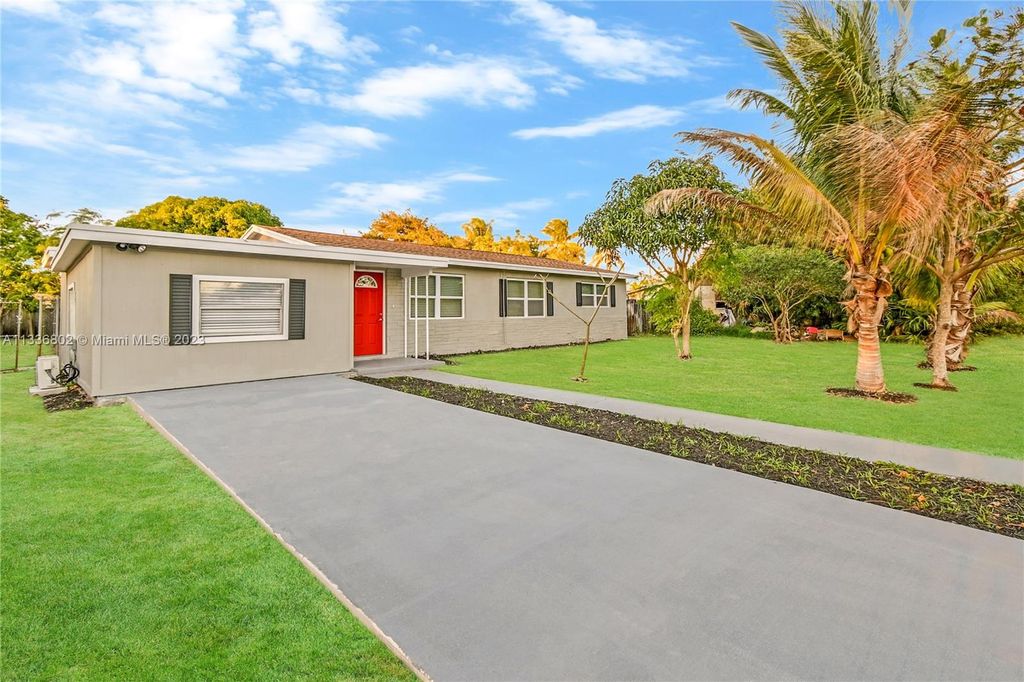 Photo of 823 Magnolia Dr, Lake Park, FL 33403 (MLS # A11336802)