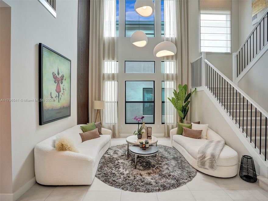 Stunning home in the prestigious Lotus Palm community, Boca Raton. This five-bedroom, seven-bathroom pool residence is exquisitely designed to showcase the best of South Florida living. Resort-style amenities include a 26,000 sq. ft. clubhouse, restaurant, fitness center, resort pool, tennis, and pickleball courts. Bedrooms feature blackout roller shades, and the master closets are fully customized. Conveniently located between Glades and Lyons Roads, with Publix Greenwise and dining options just across the street. Town Center Mall is only a 5-minute drive away!