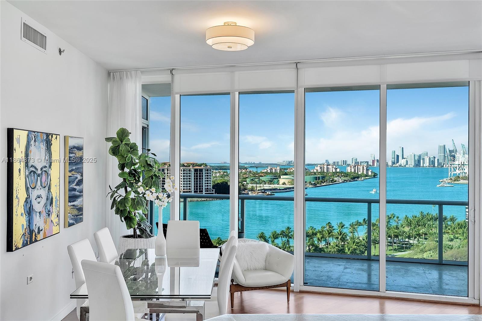 With limited inventory at the Continuum South Tower, this beautiful 2 bed 2 1/2 bath is a must see, as it's the only apt currently trading under $5 million. This bright modern cheerful unit has it all. Offering sweeping views of Miami Beach, the Miami skyline, Fisher Island, & the famous cruise ship waterway. Sit down each evening on the vast balcony & enjoy breath-taking tequila colored sunsets. As you step into the apt's private foyer, there are beautiful hardwood floors that lead into an open entertainers gourmet kitchen that overlooks a spacious living area with scenic views from every angle. With split floor plans each luxurious bedroom has updated bathrooms & walk-in closets, along with a powder room & laundry room. All of this within the renowned Continuum 5-star resort & amenities.