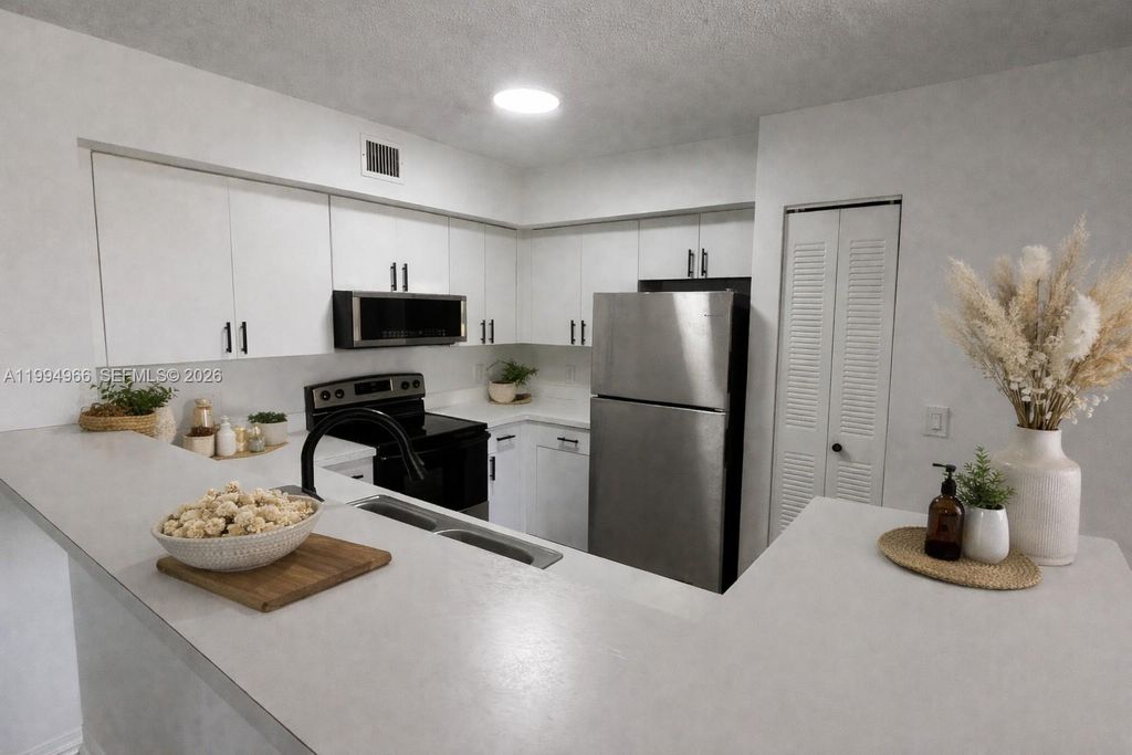 Photo of 12166 Saint Andrews Pl #108, Miramar, FL 33025 (MLS # A11994966)