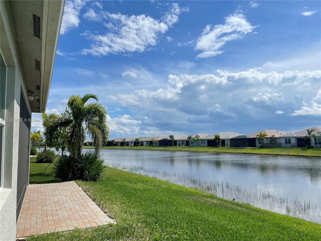 Photo of 11650 SW Moon River Way, Port Saint Lucie, FL 34987 (MLS # A11391637)