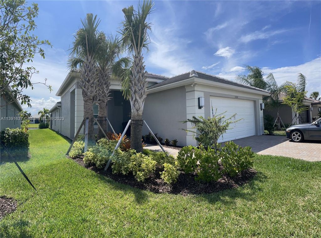 Photo of 11650 SW Moon River Way, Port Saint Lucie, FL 34987 (MLS # A11391637)