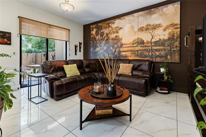 Welcome to 12704 SW 131st Terrace, a well-maintained 3-bedroom, 2.5-bathroom townhouse in the heart of Miami's West Kendall community. All three bedrooms and two full bathrooms are on the second floor, along with an in-unit washer and dryer for added everyday convenience, while a half bathroom on the first floor adds extra functionality for guests. The upgraded patio is the true gem of this home — a warm, inviting space perfectly designed for gathering with friends and family. Ideally located just minutes from London Square, home to Costco, T.J. Maxx, HomeGoods, Ross, and much more, this address sits in one of Miami-Dade's fastest-growing corridors with easy access to both the Florida Turnpike and the 826 expressway — putting all of Miami within effortless reach.