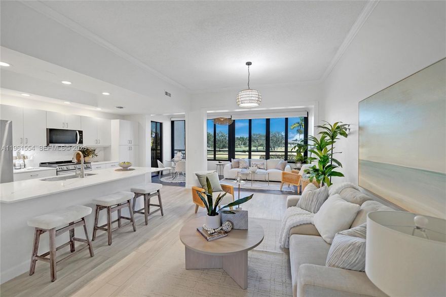 Spacious1,526 SF fully expanded and updated. 2BR/2BA condo in desirable La Paz at Boca Pointe with golf course views and ideal eastern exposure. Impact windows throughout and all plumbing replaced. Features laminate flooring, open-concept kitchen with quartz countertops, modern cabinetry, and stainless steel appliances. Primary suite offers walk-in closet with custom built-ins and renovated bath with subway tile, separate tub and shower. Second bedroom includes custom closet and access to updated guest bath with walk-in shower. Newer front-loading washer/dryer. La Paz offers two pools, two tennis courts, and a clubhouse. Per county permits, actual living area is approximately 1,526 SF. Tax records reflect 1,323